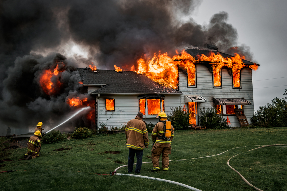 firefighters putting out a house fire
