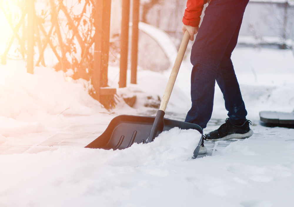 shoveling snow outside