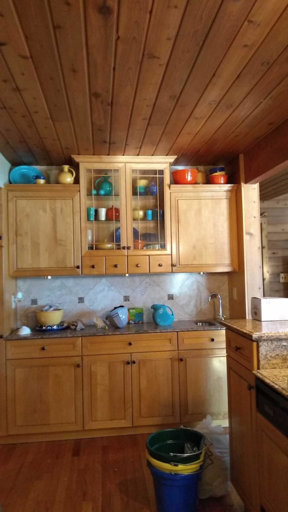 A Remodeled Kitchen with Handcrafted Wood Cabinetry and Granite Countertops in Oconomowoc, WI