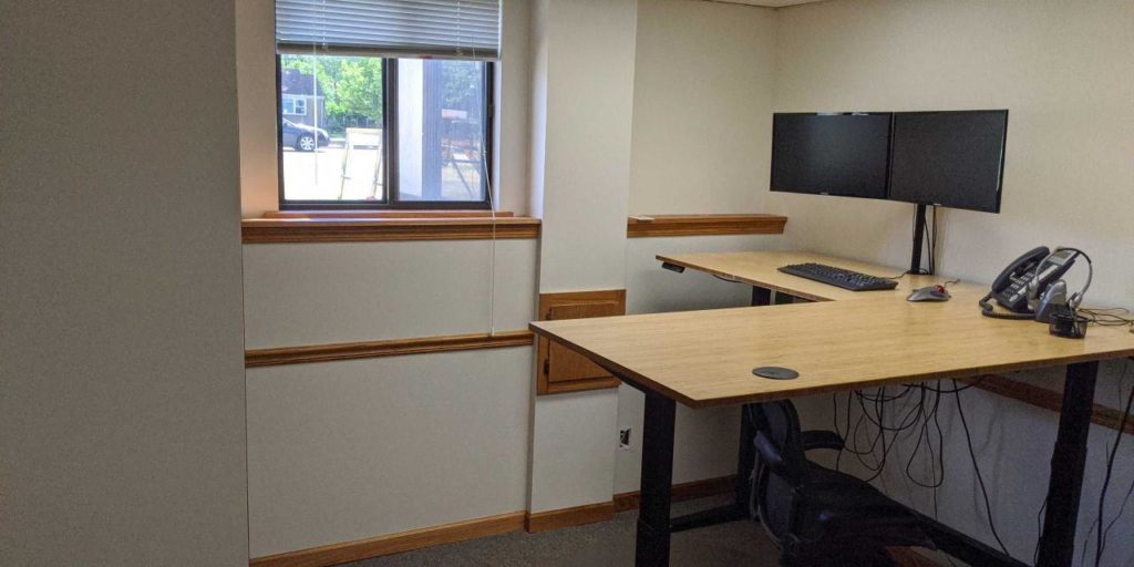 Well-renovated office space with a desk and computer setup in Brookfield, Wisconsin 