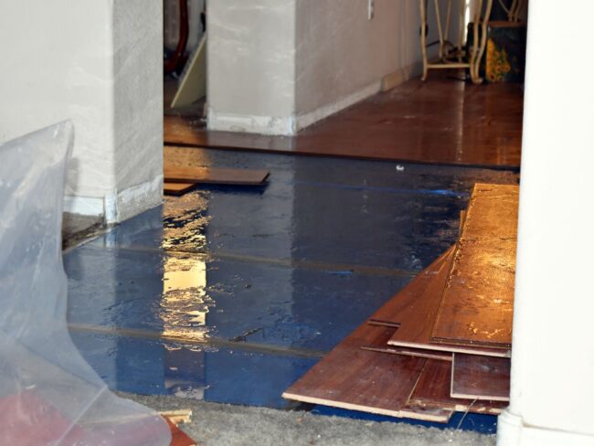 Water damaged hardwood floor repair by restoration experts in Wauwatosa, WI