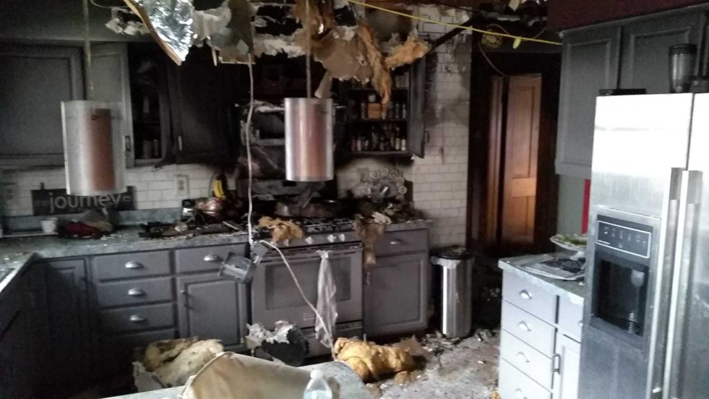 Collapsed kitchen ceiling following house fire