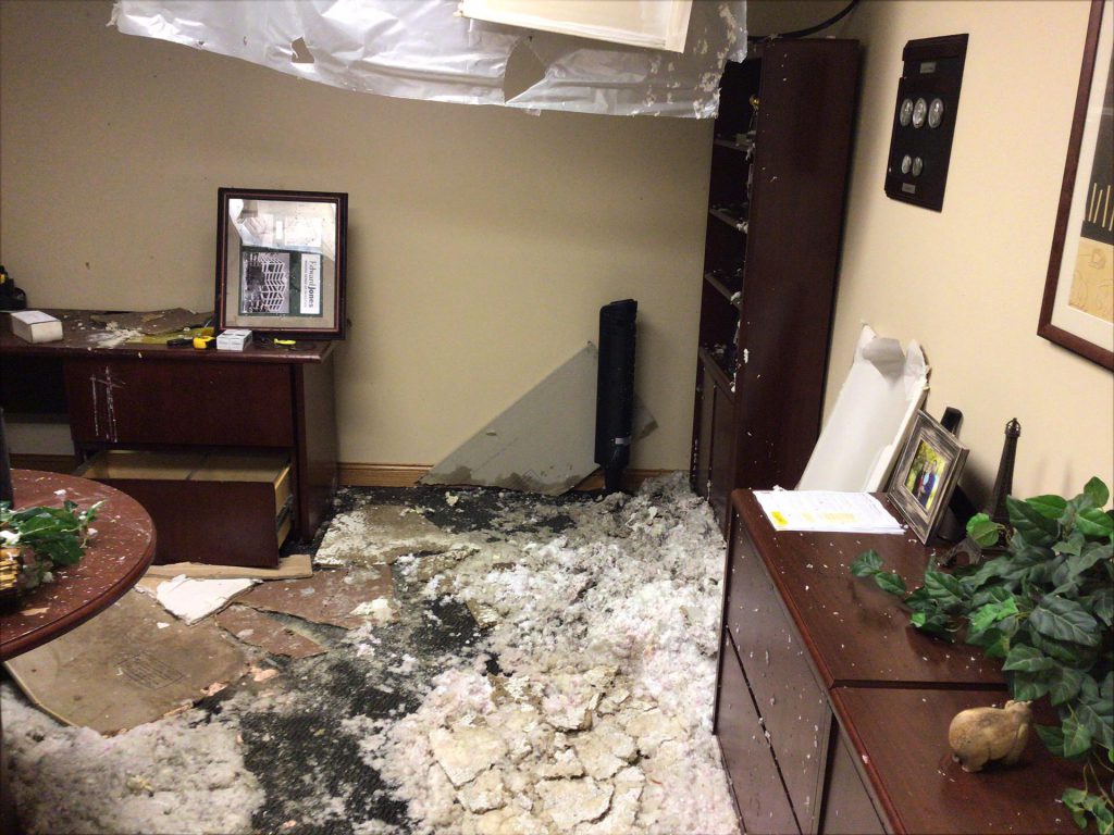 Collapsed ceiling after sustaining water damage in Muskego